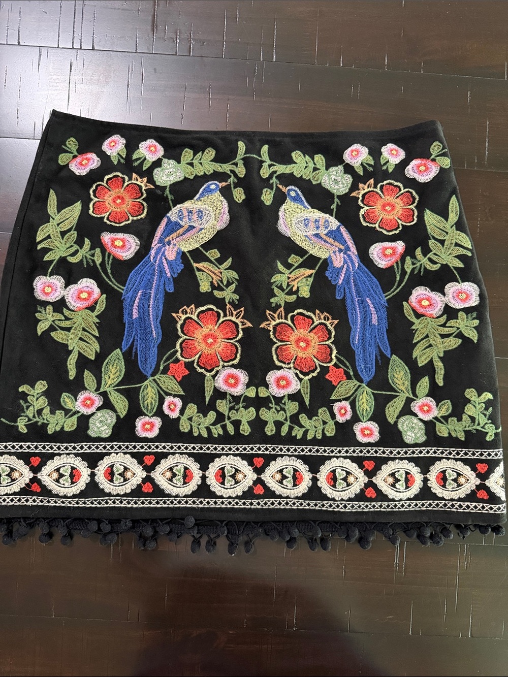 Umgee Black Mini Skirt with Blue Parrot Embroidery